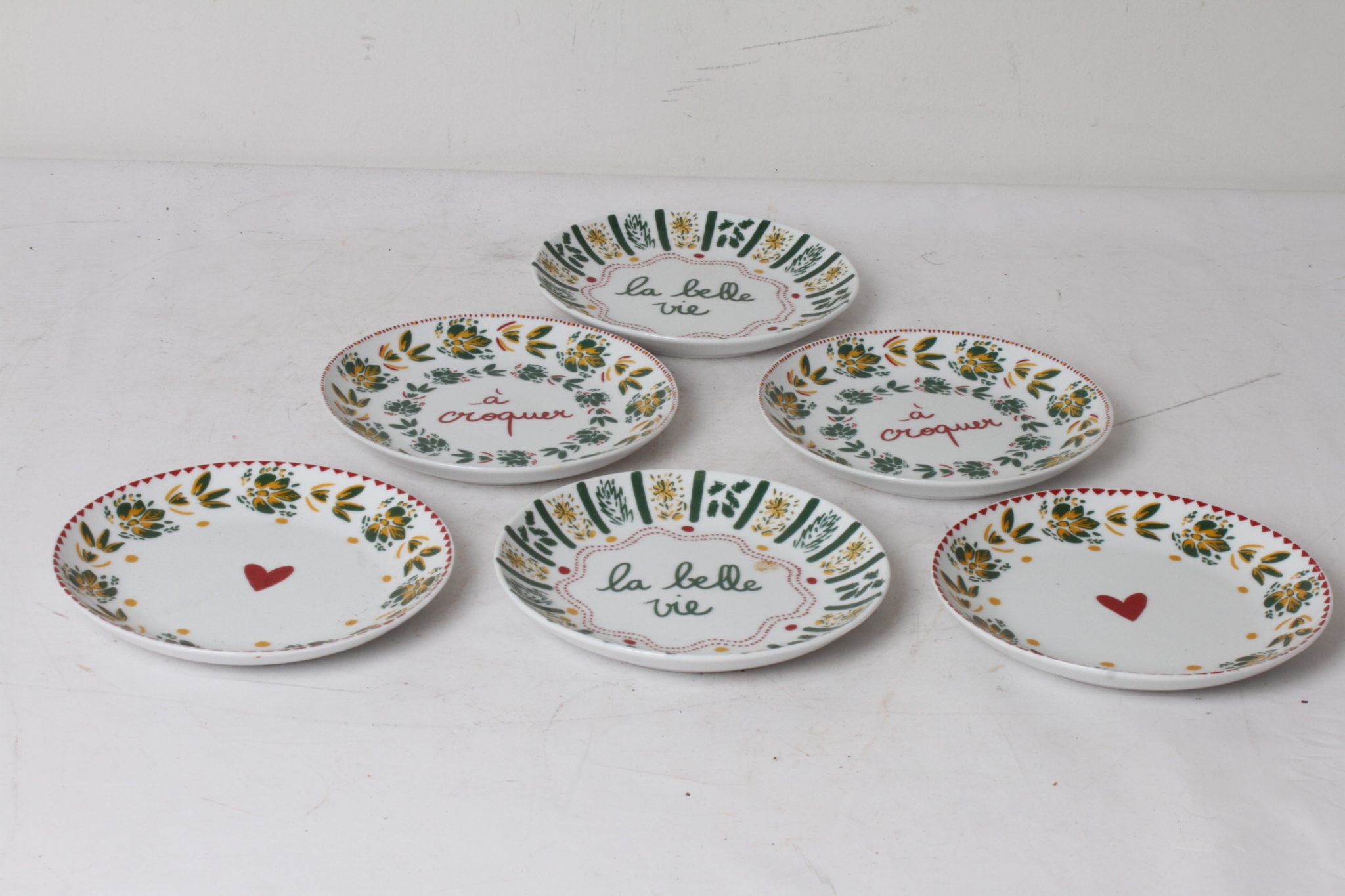 Lot de six petites assiettes en porcelaine - Fragonard