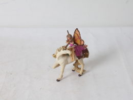 Figurine Enfant elfe sur une licorne