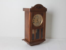 Ancienne pendule murale en bois
