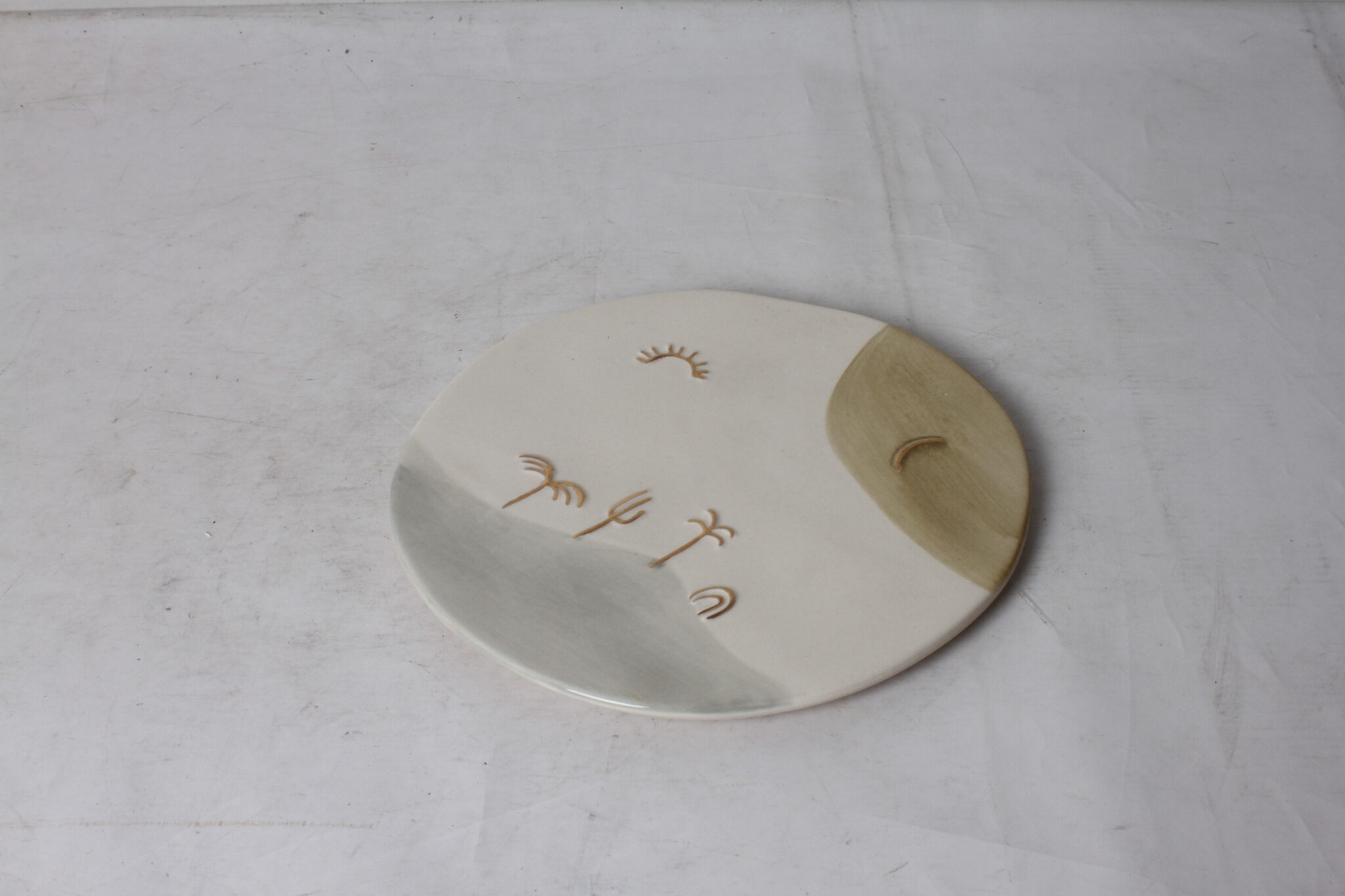 Assiette plate en céramique