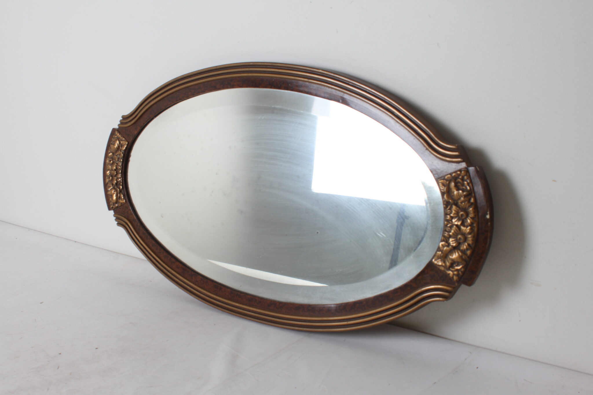 Ancien miroir mural ovale